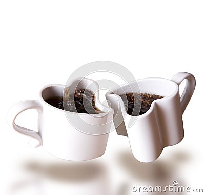 Two heart shaped love cups of coffee levitating Stock Photo