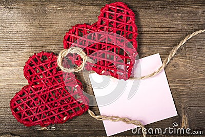 Two Hearts on burlap Background. Wedding Love Concept Stock Photo