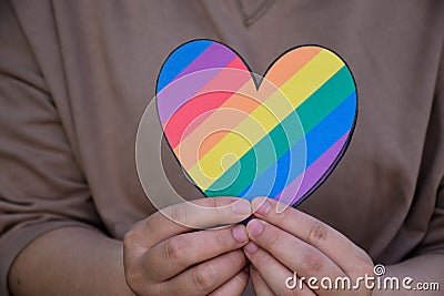 Two hearts made of rainbow colored paper Stock Photo