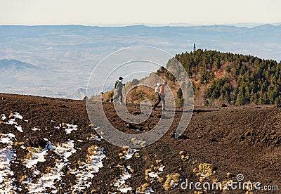 Two Hikers on Mount Etna Volcano - Sicily Italy Editorial Stock Photo