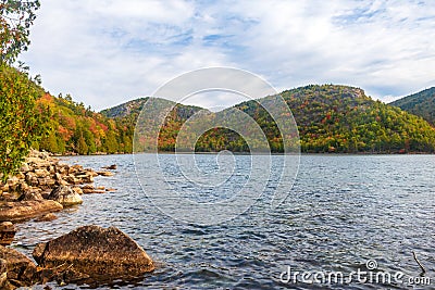 Two hills, known as the Bubbles, and Jordan Pond Stock Photo