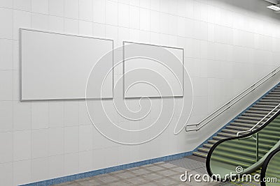 Two horizontal posters mock up on the wall with escalator and stairs Stock Photo