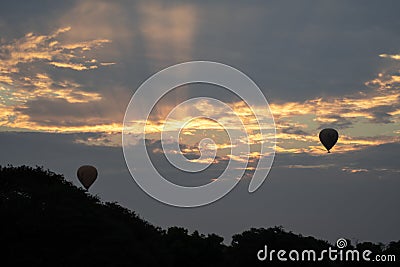 Two hot air balloons in the sky during sunrise in Bagan, Nyaung-U, Myanmar Editorial Stock Photo