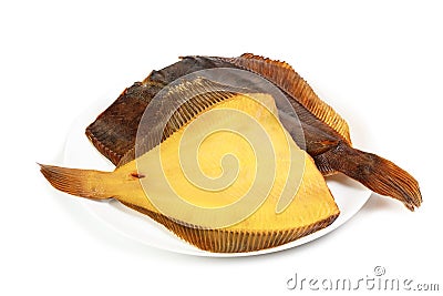 Two hot smoked flatfish on plate Stock Photo