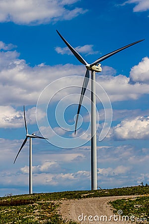 Two Huge High Tech Industrial Wind Turbines Generating Environmentally Sustainable Clean Electricity in Oklahoma. Stock Photo