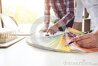 Two interior design or graphic designer at work on project of ar Stock Photo