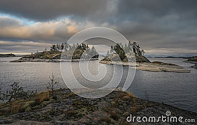 Two islands covered in forest. Nordic landscape. Scenic view Stock Photo