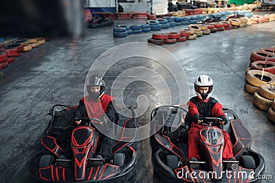 Two kart racers on start line, karting auto sport Stock Photo
