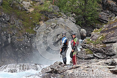 Two kayaker man on the river bank. Editorial Stock Photo