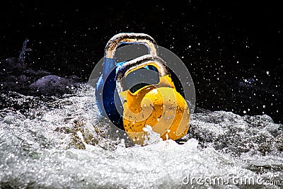 Two Kettlebells In the Water Stock Photo