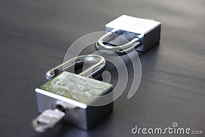 Two keys locked and not locked on success in business and have i Stock Photo