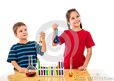 Two kids with chemical flask Stock Photo