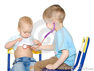 Two kids playing doctor Stock Photo