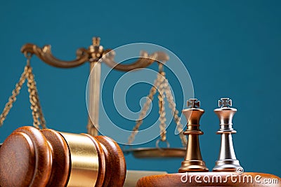 two kings chess piece ,lgavel hammer and libra scale Stock Photo