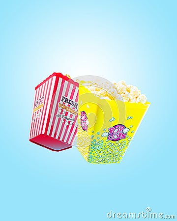 Two large servings of fresh, hot, buttered and caramel popcorn on a bright blue background. Movie night concept poster banner Stock Photo