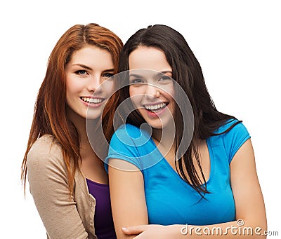 Two laughing girls hugging Stock Photo