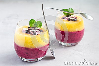 Two layer smoothie for breakfast in glass, horizontal Stock Photo