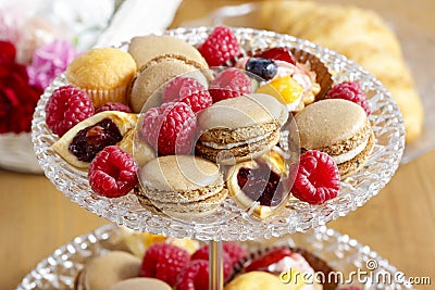 Two level dessert stand full of sweets Stock Photo