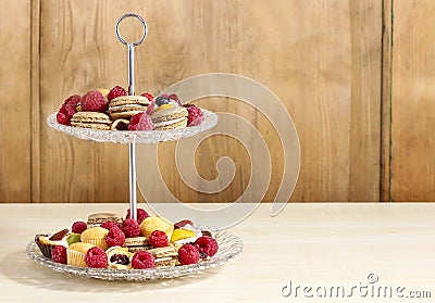 Two level dessert stand full of sweets Stock Photo