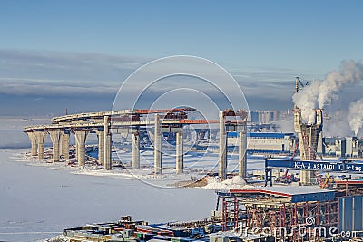 Two-level highway bridge flyover through Sea Canal under construction, Saint-Petersburg. Editorial Stock Photo