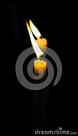 Two lighted candles Stock Photo