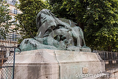 Two lions disputing a boar, Tuileries Garden Editorial Stock Photo