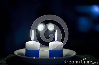 Two lit candles Stock Photo