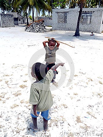 Two little African boys playing on Jambiani beach, Zanzibar Editorial Stock Photo
