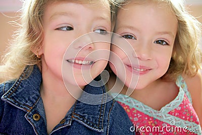 Two little beautiful toddler twin sisters Stock Photo