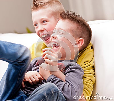 Two little boys laughing Stock Photo