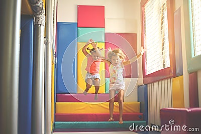 Two little girls in playground. Caucasian girls playing together Stock Photo