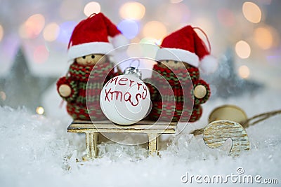 Two little snow girl wish merry xmas, bokeh Stock Photo