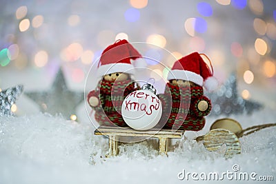 Two little snow girl wish merry xmas, bokeh Stock Photo