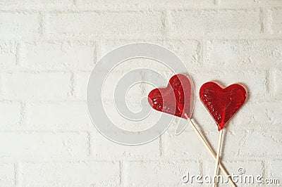 Two lollipops. Red hearts. Candy. Love concept. Valentine day. Stock Photo