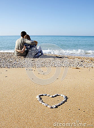 Two lovers on the beach Stock Photo