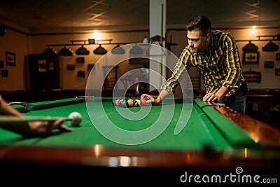 Two male billiard players leisures in poolroom Stock Photo