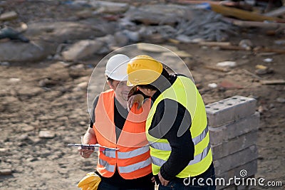 Two male civil engineers at work Stock Photo