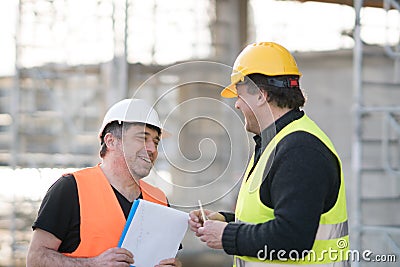 Two male civil engineers at work Stock Photo