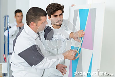 Two male painters training Stock Photo