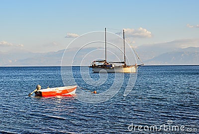 Two Masted Sailing Yacht Anchored in Bay, Greece. Editorial Stock Photo