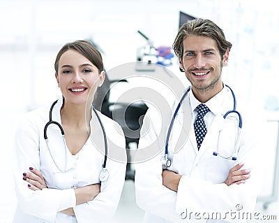 Portrait of two successful professional doctors workers in coats Stock Photo