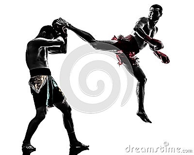 Two men exercising thai boxing silhouette Stock Photo