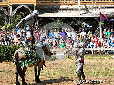 Two men on a knight tournament at Renaissance Festival Editorial Stock Photo