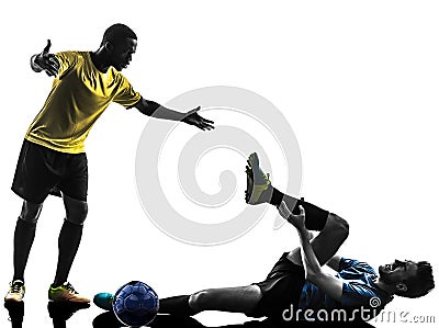 Two men soccer player standing complaining foul silhouette Stock Photo