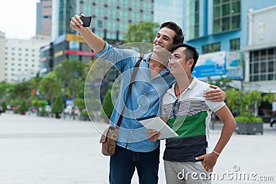 Two men tourists taking selfie photo smile, asian Stock Photo