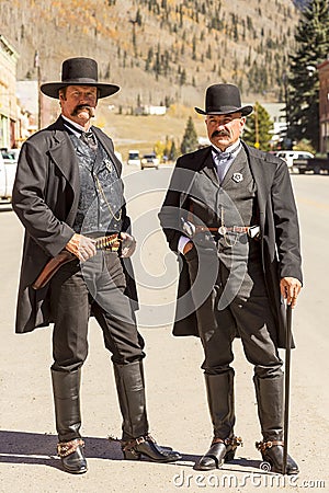 Two men wearing moustaches and vintage Old West Sheriff outfits Editorial Stock Photo