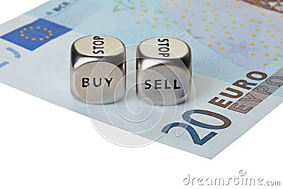 Two metal dices with words Buy and Sell on twenty-euro banknote Stock Photo