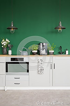 Two metal lamps above kitchen counter Stock Photo