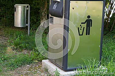 Two metal litter bins in public spaces. Stock Photo