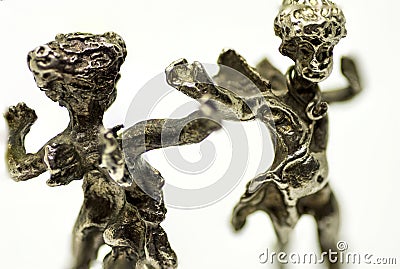 Two metallic dancing angels, dance with them Stock Photo